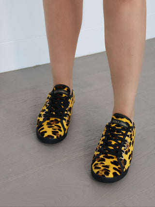Dolce and Gabbana yellow leopard print calf hair low top sneakers with lace-up design and rubber sole