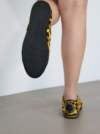 Dolce and Gabbana yellow leopard print calf hair low top sneakers with lace-up design and rubber sole
