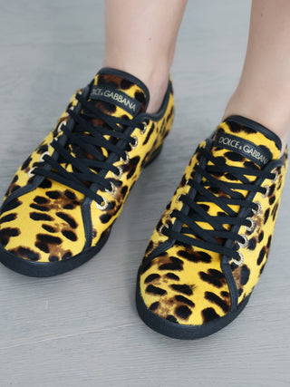 Dolce and Gabbana yellow leopard print calf hair low top sneakers with lace-up design and rubber sole