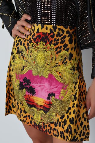 Versace x H&M 2011 leopard print silk mini skirt with central pink sunset graphic and baroque detailing