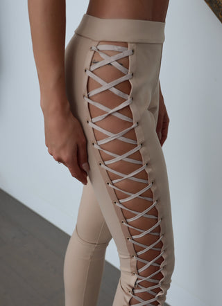 Fenty Puma by Rihanna beige lace-up leggings with fitted silhouette and stretch fabric