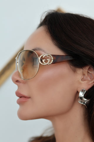 Gucci GG interlocking aviator sunglasses in brown and gold with classic aviator shape