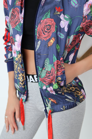 Adidas Originals x Rita Ora navy blue track jacket with floral and insect print and zip front