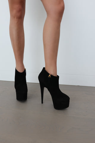 Giuseppe Zanotti black suede platform ankle boots with gold zip detail – luxury Italian designer boots, available at Luxury Kulture.