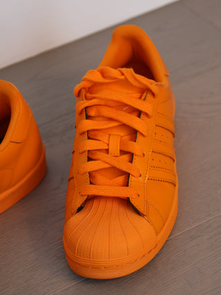 Adidas Originals Pharrell Williams orange supercolor sneakers shell toe leather trainers