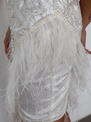 Portia & Scarlett white embellished mini evening dress with feather trim, fitted silhouette.