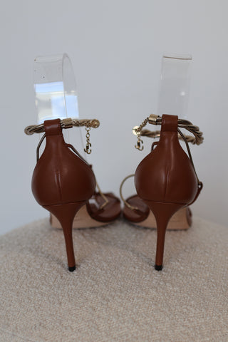 Jimmy Choo Oriana 75 camel leather heels with gold chain ankle straps and square toe design, size EU 38.5.