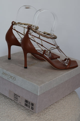 Jimmy Choo Oriana 75 camel leather heels with gold chain ankle straps and square toe design, size EU 38.5.