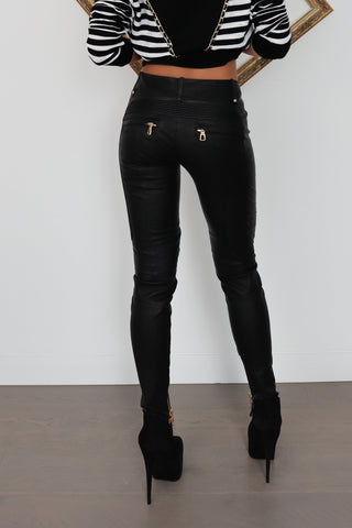 Balmain x H&M black quilted leather biker pants, slim-fit silhouette, size EU 34.