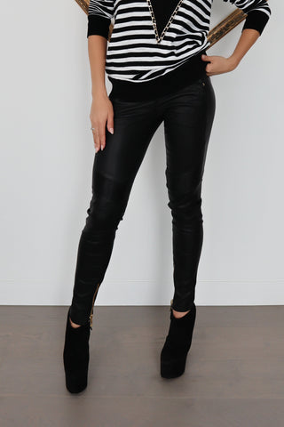 Balmain x H&M black quilted leather biker pants, slim-fit silhouette, size EU 34.