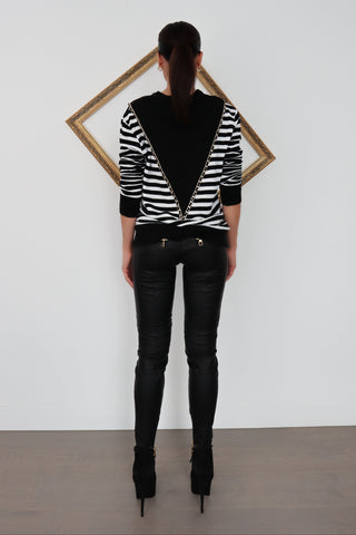 Balmain x H&M black quilted leather biker pants, slim-fit silhouette, size EU 34.