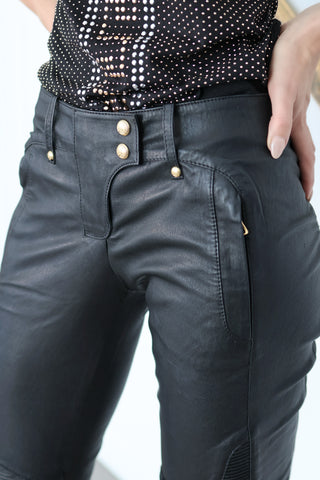 Balmain x H&M black quilted leather biker pants, slim-fit silhouette, size EU 34.