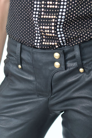 Balmain x H&M black quilted leather biker pants, slim-fit silhouette, size EU 34.