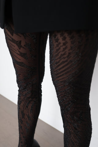 Mugler x H&M black sheer mesh tights with all-over rhinestone embellishment in a signature starburst pattern, new with tags.