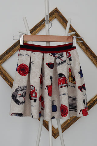 Monnalisa girls ivory floral skirt with red and blue vintage-style print, size 6 years.