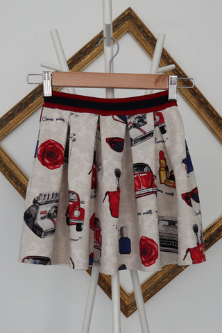 Monnalisa girls ivory floral skirt with red and blue vintage-style print, size 6 years.