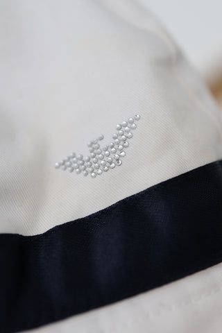 Armani Junior white cotton hat with navy eagle logo, size II.