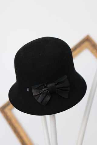 Christian Dior black lamb leather and wool hat for girls, size 3T.