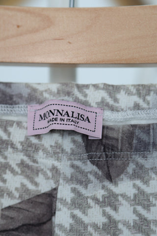 Monnalisa girls multicolour floral and houndstooth print leggings, size 8 years.