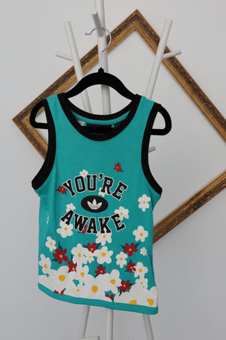 Adidas Originals x Pharrell Williams turquoise “You’re Awake” daisy tank top, size 3–4 years.