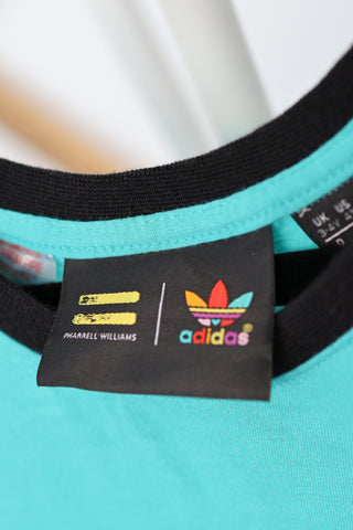 Adidas Originals x Pharrell Williams turquoise “You’re Awake” daisy tank top, size 3–4 years.