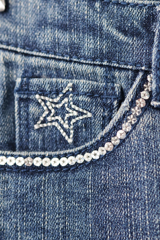 Levi’s girls blue flare jeans with sparkly star embroidery on front and back pockets, size 4.