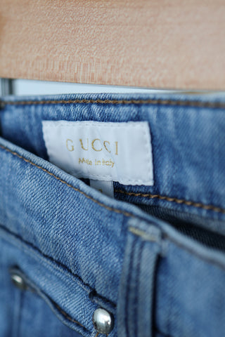 Gucci kids blue skinny jeans with logo patch, size 3 years.