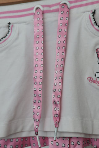 Monnalisa girls white Tweety Bird top with pink bow and matching skirt, size 3 years.