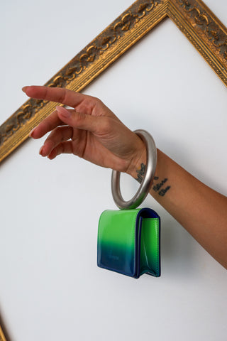 Salvatore Ferragamo green and blue airbrushed micro pouch new with tags.