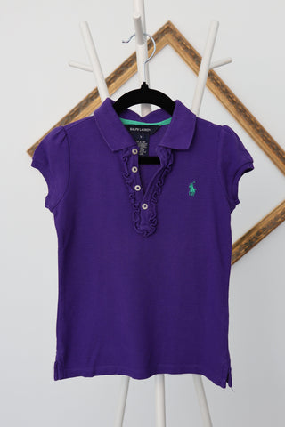 Ralph Lauren girls purple polo shirt with ruffled placket and green embroidered logo.