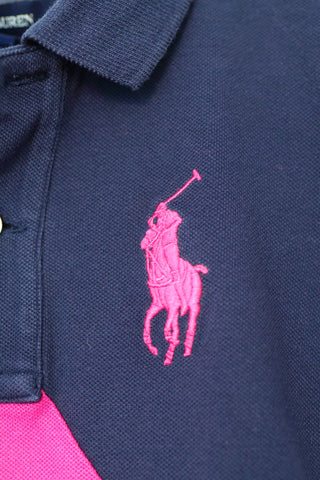 Ralph Lauren girls navy polo shirt with pink diagonal stripe and embroidered pony logo.