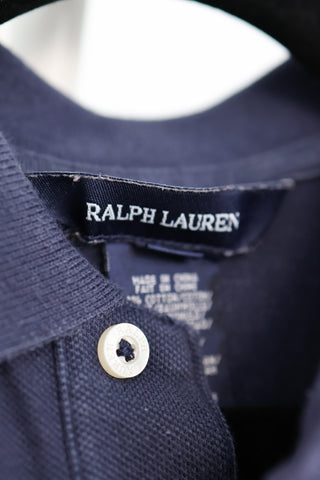 Ralph Lauren girls navy polo shirt with pink diagonal stripe and embroidered pony logo.