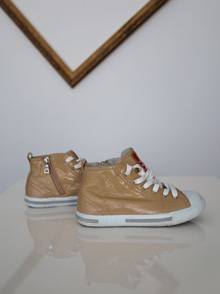 Prada toddler beige patent leather high-top sneakers with lace-up and side zip closure.