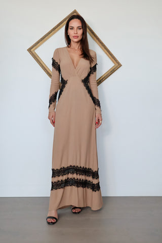 For Love & Lemons nude full-length dress with a plunging V-neckline, long sleeves and contrasting black eyelash lace detailing throughout.