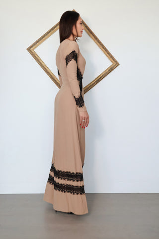 For Love & Lemons nude full-length dress with a plunging V-neckline, long sleeves and contrasting black eyelash lace detailing throughout.