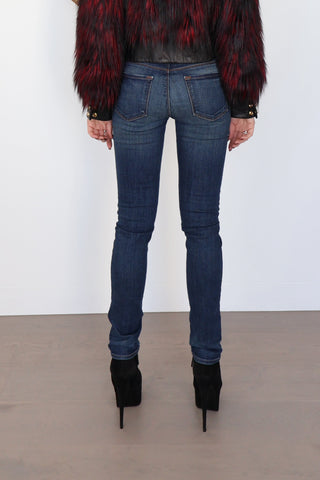 J Brand dark-wash skinny jeans with subtle fading, photographed on model for Luxury Kulture.