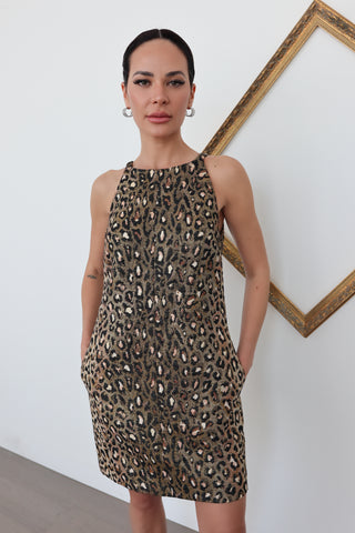 Saint Laurent metallic leopard jacquard mini dress with high neckline and A-line silhouette, photographed for Luxury Kulture.