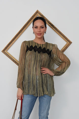 Model wearing a sheer green and gold pleated Zimmermann blouse with black lace detailing, shown from front, back, side and close-up views to highlight the fabric texture and lace panel.