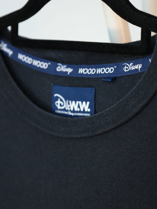 Wood Wood x Disney black Mickey Mouse graphic T-shirt hanging on display