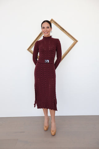 Zimmermann burgundy wool knit high-neck maxi dress with belt and scalloped detailing, photographed on model for Luxury Kulture.
