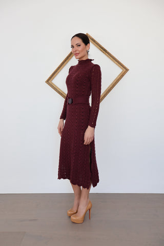 Zimmermann burgundy wool knit high-neck maxi dress with belt and scalloped detailing, photographed on model for Luxury Kulture.