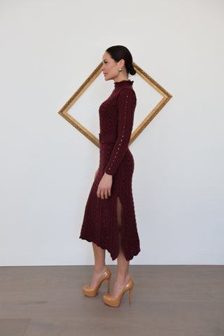 Zimmermann burgundy wool knit high-neck maxi dress with belt and scalloped detailing, photographed on model for Luxury Kulture.