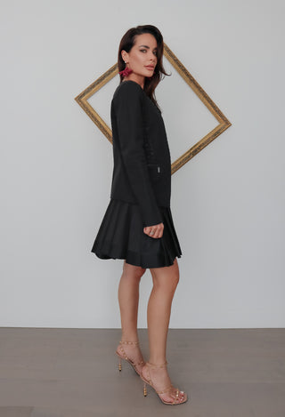 Michael Michael Kors black cutaway jacket with grommet detailing, tailored fit, size 4.
