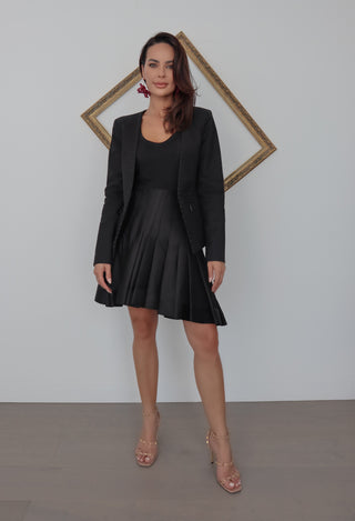 Michael Michael Kors black cutaway jacket with grommet detailing, tailored fit, size 4.