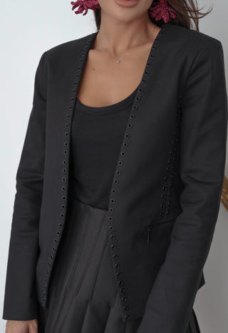 Michael Michael Kors black cutaway jacket with grommet detailing, tailored fit, size 4.