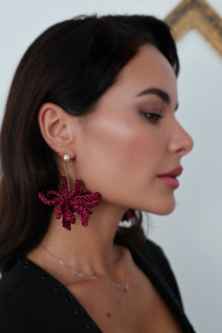 Lucy Folk Spritz pink plaited Lurex earrings with pearl accents.