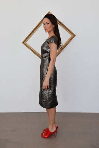 Dolce & Gabbana gunmetal metallic sheath dress with leopard lining, size 40, shown on model.