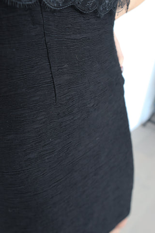 Sandro black lace-overlay cocktail dress on model, size 1