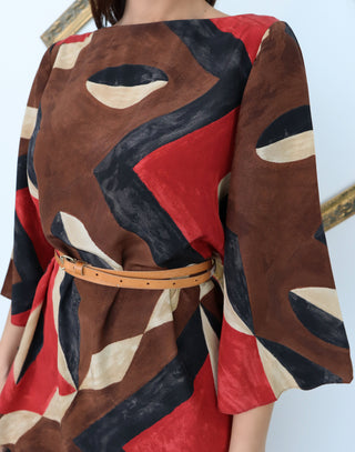 Ralph Lauren silk geometric print blouse with waist belt detail and relaxed fit silhouette.