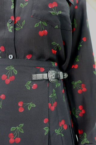 The Kooples black cherry print silk shirt and mini skirt set with belt detail.